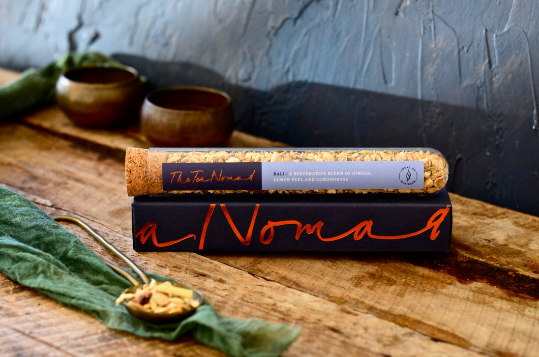 Test Tube of The Tea Nomad's Bali tea- test tube of looseleaf, organic ginger tea with ginger, lemon peel and lemongrass