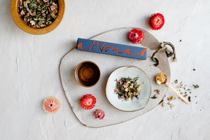 Shanghai tea blend by The Tea Nomad- a floral, white tea featuring chrysanthemum and osmanthus flowers, pink rose petals and a touch of lychee. 