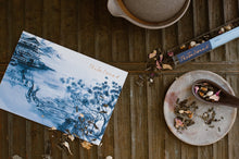 Load image into Gallery viewer, The Tea Nomad&#39;s Kyoto tea blend - a sencha green tea featuring yuzu, jasmine flowers, pink rose petals and orange peel.